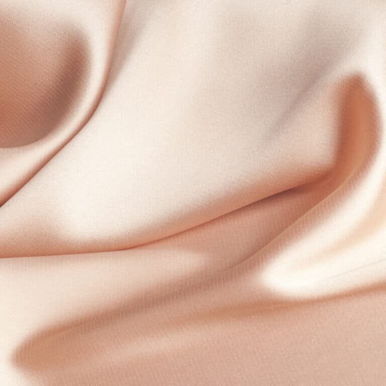 tissue, textile, cloth, fabric, material, texture. beige color. cloth, typically produced by weaving or knitting textile fibers.