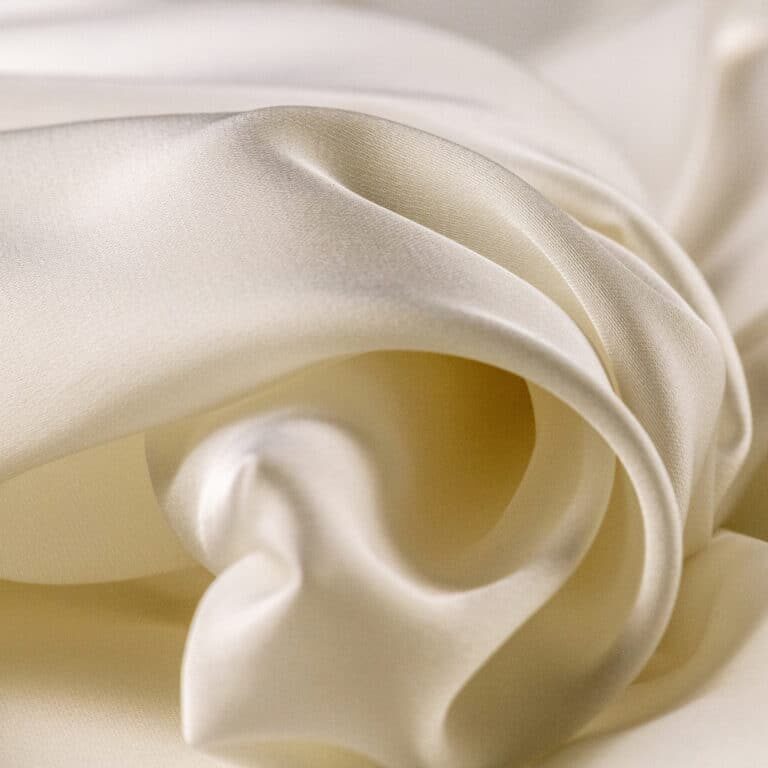 Texture, background, template. Silk fabric white, silk drapery and upholstery fabric from the courtyard - curtains - Solid fabrics for backs and pillows and pearls