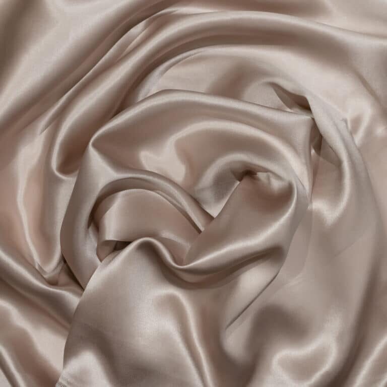 The texture of the mullbery silk textile fabric pink color for background