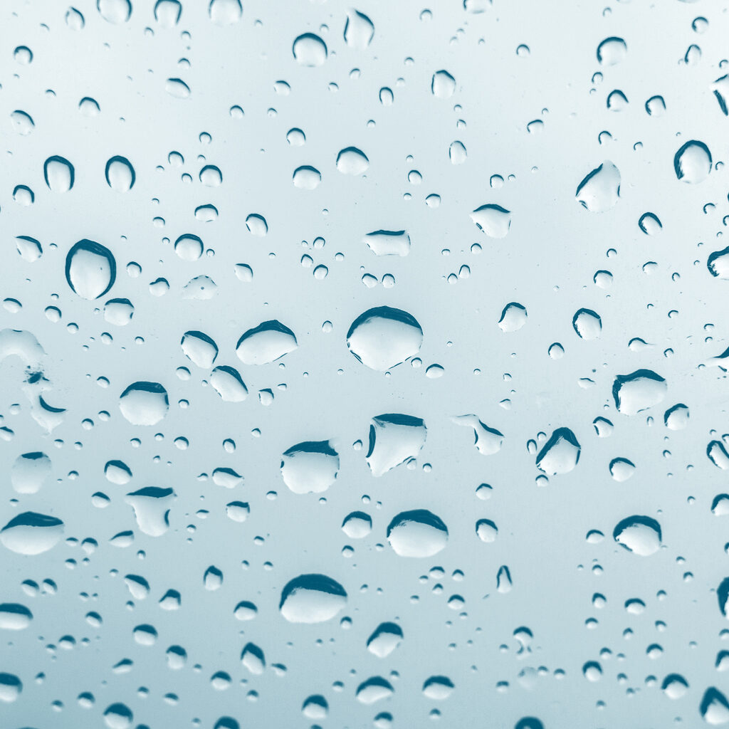 Water drop and droplet on mirror bright.