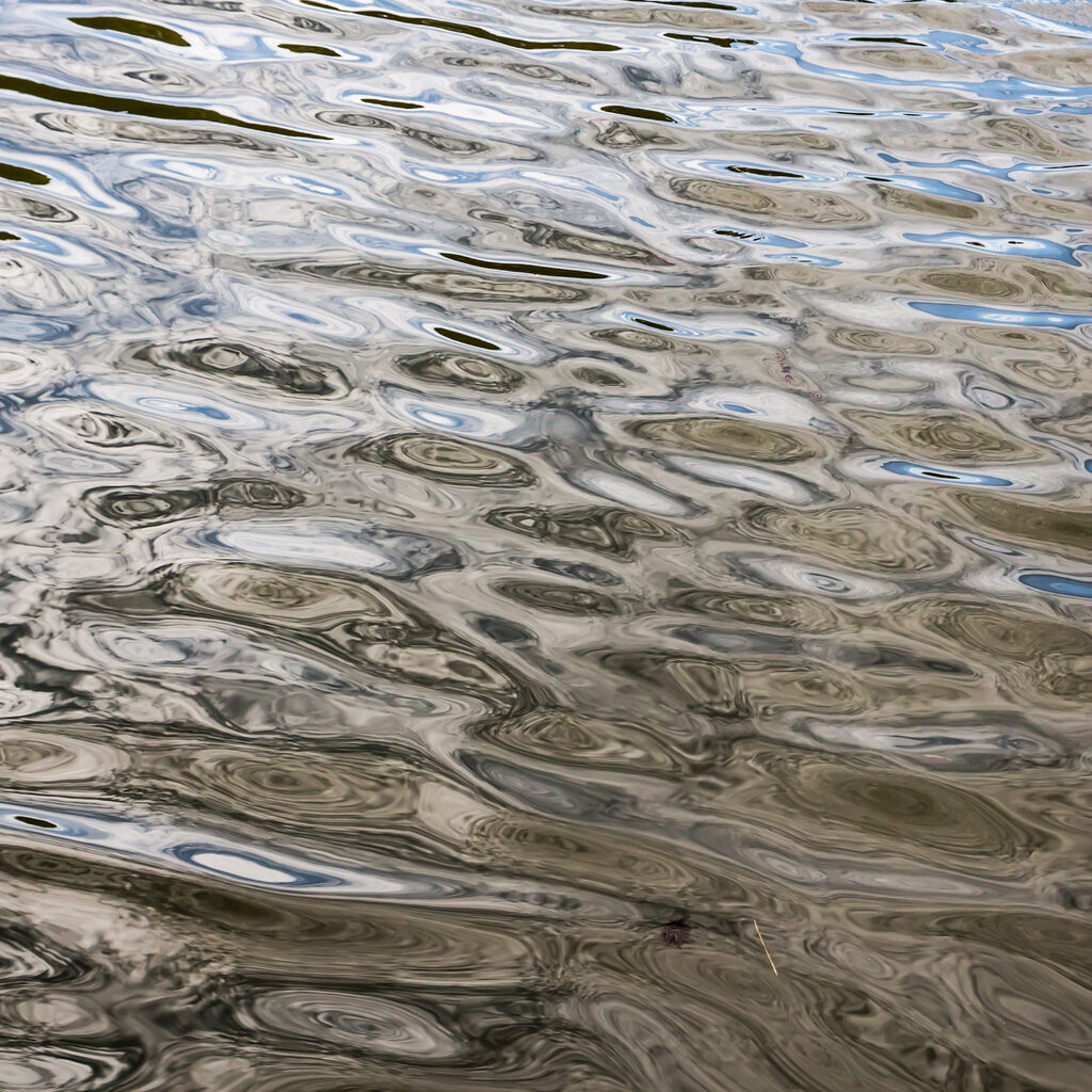 Movement of water in the river,Surface to the wind.