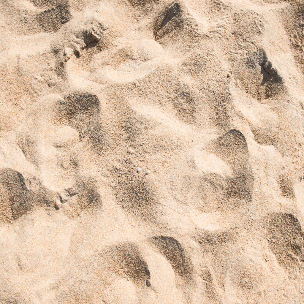 Sand texture on tropical beach sunny day